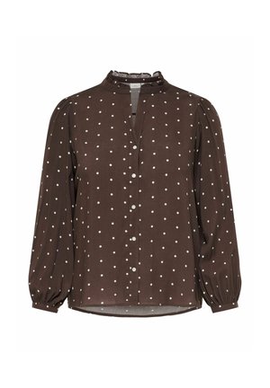 Blouse marron à manches longues avec des pois blancs, col haut à volants et fermeture boutonnée à l'avant.