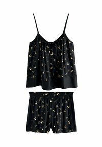 Ensemble de nuit noir composé d'un camisole ample et d'un short, tous deux ornés d'un imprimé doré représentant de petits objets. Texture soyeuse avec des bretelles réglables.