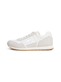White and gray athletic shoe with mesh and suede materials, rounded shape, lace-up design, and a rubber sole. Features a subtle logo detail.