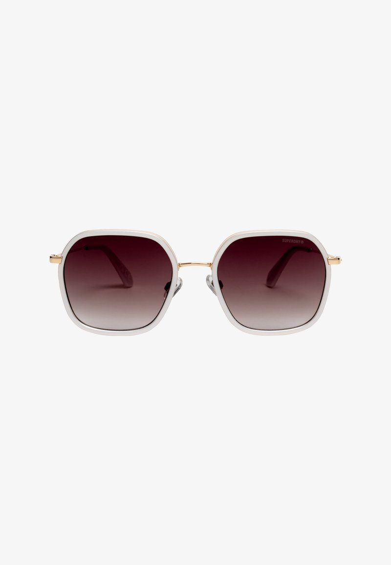 Lunettes de soleil blanches à monture carrée avec charnières dorées et verres à dégradé foncé, vues de face sur fond blanc.
