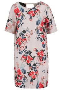 Béžové květinové šaty s krátkým rukávem, modrými, červenými a zelenými vzory. Mají kulatý výstřih a detail s otevřeným zády.