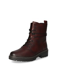 Bottines en cuir marron à lacets avec une pointe arrondie, surface texturée, lacets noirs et semelle en caoutchouc robuste.