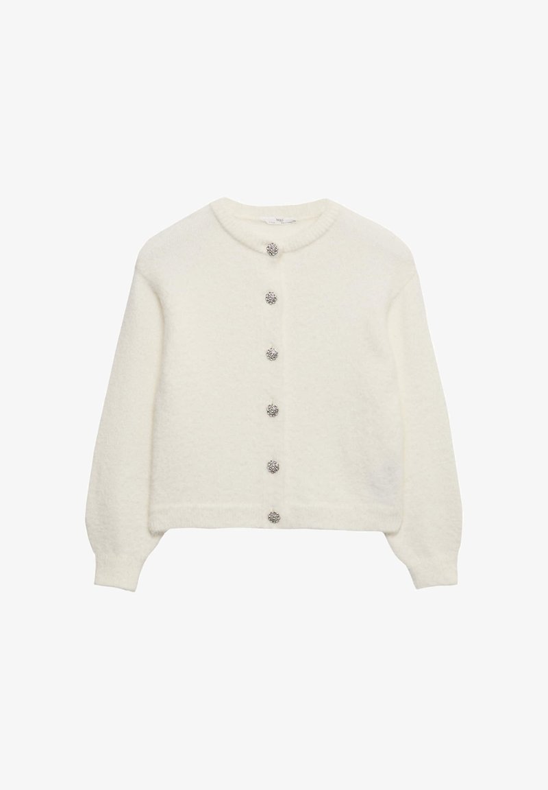 Cardigan de manga larga color crema con seis botones decorativos plateados en forma de flor en el frente y un cuello redondo acanalado.
