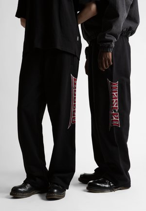 PUSHER JOGGING UNISEX - Verryttelyhousut - black
