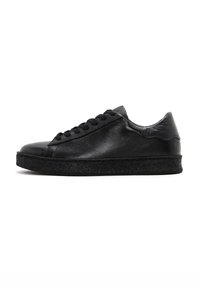 Black leather sneaker with a smooth texture, rounded toe, and flat black rubber sole. Features classic lace-up design and minimalistic style.