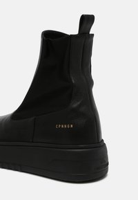 Copenhagen Studios Botines con plataforma - black