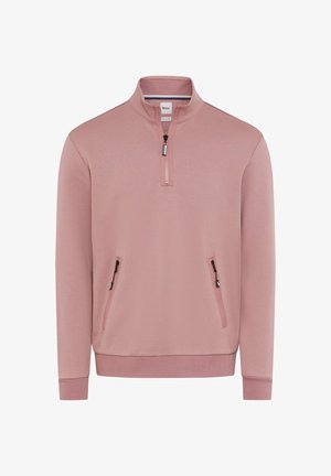 Herreblyant i støvet rosa med kvart lynlås, stående krave og to frontlynlåslommer, ribbede manchetter og kant.