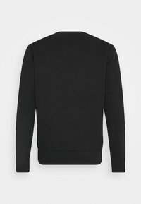 Sweat-shirt noir avec col rond, manches longues et poignets côtelés. Le tissu semble lisse, sans motifs ni ornements.