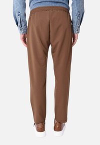 Ciabalù Pantaloni - marrone