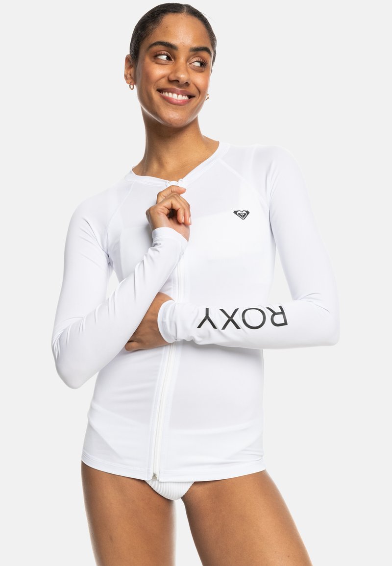 White long-sleeve zip-up rash guard featuring a logo on the chest and sleeve. Made of smooth, stretchy fabric, designed for water activities.