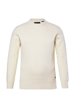 Pull en maille crème à manches longues avec col rond, présentant des poignets et un ourlet côtelés, affiché sur fond blanc.