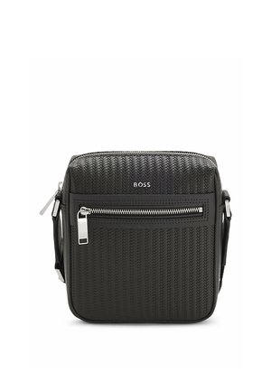 Black textured crossbody bag with front zip pocket, silver zipper pulls, and adjustable shoulder strap, branded "BOSS" on front center.