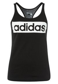 Czarny sportowy top na ramiączkach typu racerback. Na piersi wyróżnia się biały napis „adidas”. Wykonany z gładkiej tkaniny.