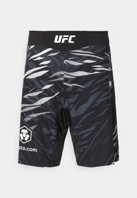 Black athletic shorts featuring a dynamic monochrome pattern, UFC logo on the waistband, and contrasting graphics on the side.
