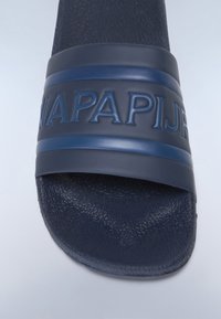 Navy blue slide sandal with textured sole, wide upper strap embossed with "NAPAPIJRN", featuring a smooth finish and subtle accent stripes.