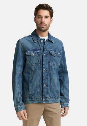 Light blue denim jacket with a classic design, featuring two chest pockets, button closure, and stitched detailing on the front and sleeves.