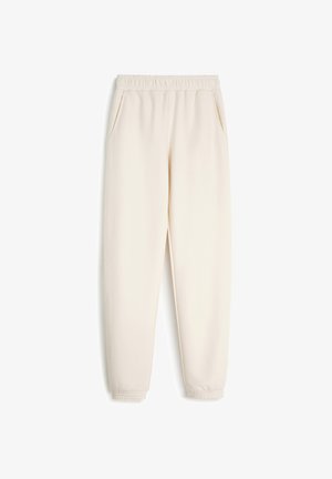 Joggery w kolorze kremowym z elastycznym paskiem w talii, bocznymi kieszeniami i zwężającymi się mankietami. Wykonane z miękkiej, lekkiej tkaniny o gładkiej fakturze.