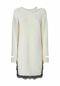 Abito maglione bianco a coste con maniche lunghe, dotato di scollo rotondo e rifinitura in pizzo nero sull'orlo, con aperture laterali alle maniche.