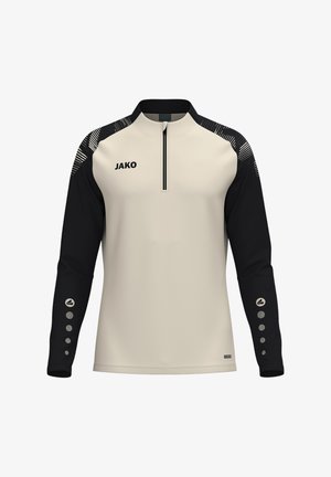 Langærmet atletisk top med beige front og sorte ærmer, lynlåskrave, mønstrede skulderdetaljer, JAKO-logo på brystet og knap-lignende designs på ærmerne.