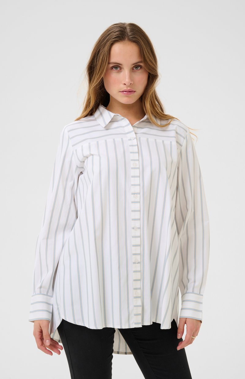 White button-up shirt with vertical light gray stripes, long sleeves, and a curved hem. Features a chest pocket and elegant collar design.