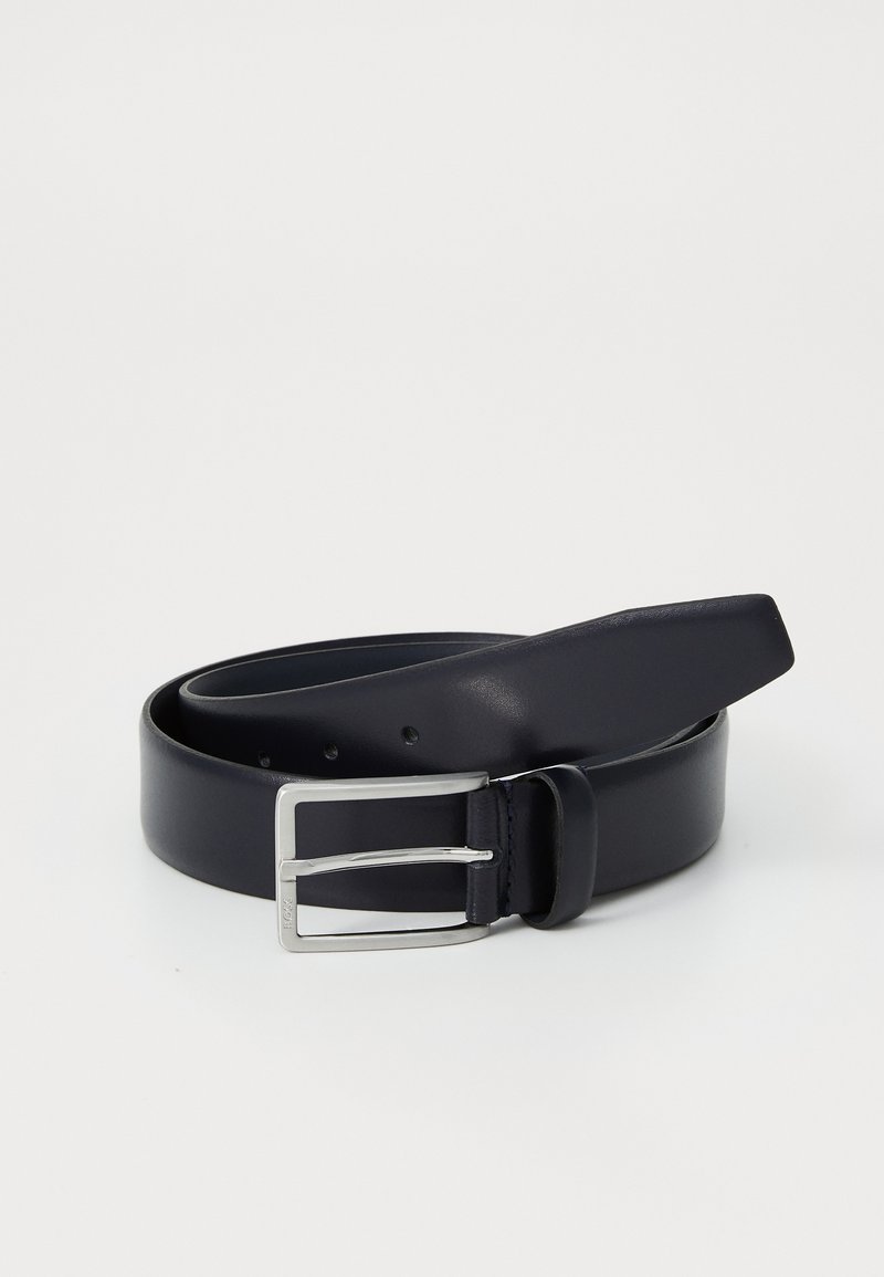 Navy leather belt with a silver metal buckle, featuring a smooth texture and multiple holes for adjustment. Ends taper to a rounded tip.