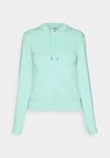 SKARE - Lukuga pusa - ice green