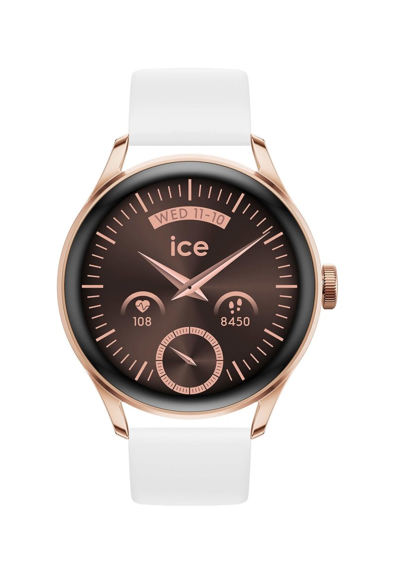 Orologio smartwatch rotondo con quadrante marrone, accenti in oro rosa, cinturino in silicone bianco, che mostra la data e le metriche di fitness.