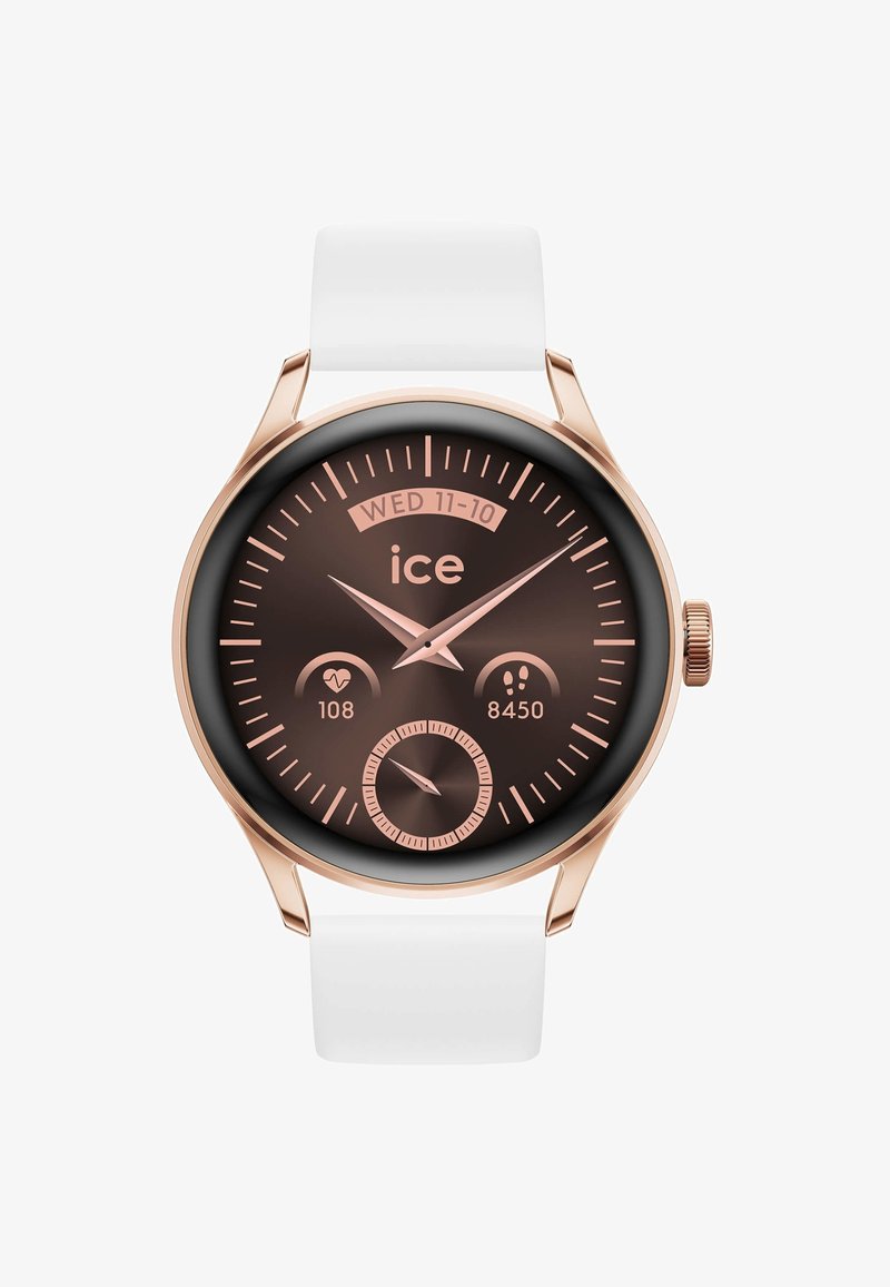 Orologio smartwatch rotondo con quadrante marrone, accenti in oro rosa, cinturino in silicone bianco, che mostra la data e le metriche di fitness.