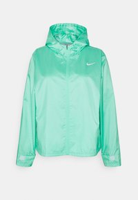 Lichtgroene Nike windbreaker jas met capuchon, volledige voorkant rits en verstelbare manchetten aan lange mouwen.