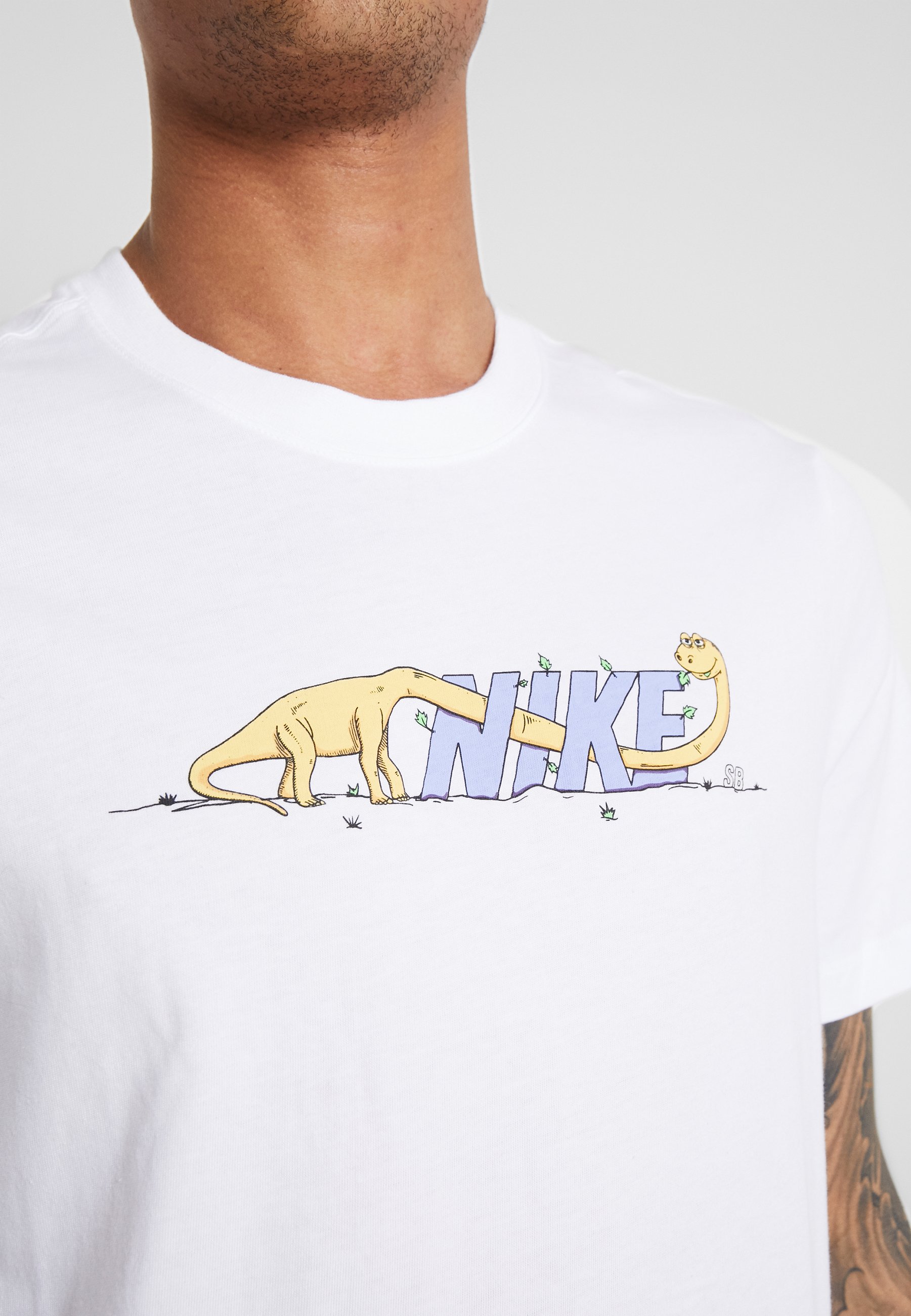 nike dinosaur t shirt