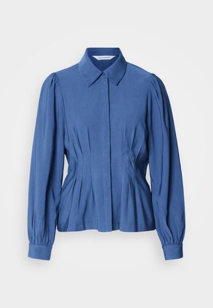 Kék, hosszú ujjú blúz strukturált gallérral, pliszírozott részletekkel a deréknál és ráncolt ujjakkal, sima anyagból.