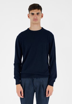 - Sweter