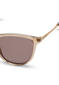 Transparante beige zonnebril met bruin getinte lenzen en slanke beige pootjes.