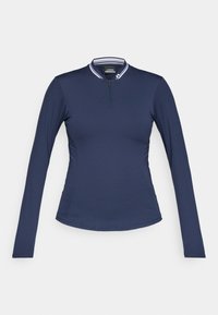 Camicetta a maniche lunghe blu navy realizzata in tessuto morbido, con colletto a mezza zip e dettagli a strisce bianche, dal design aderente.