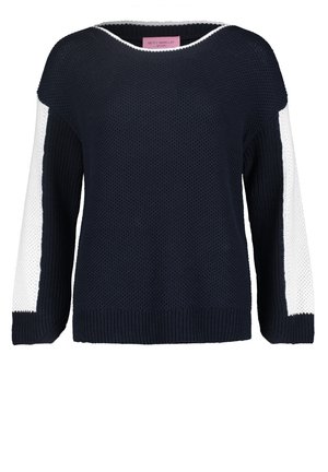 Granatowy sweter z dzianiny z białymi panelami biegnącymi wzdłuż zewnętrznych rękawów, z okrągłym dekoltem oraz ściągaczami na mankietach i u dołu.