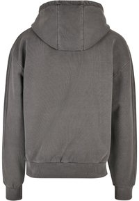 Felpa con cappuccio grigio scuro, a maniche lunghe, con polsini a costine e un bordo a costine in vita, mostrata dal retro.