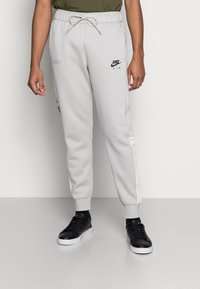 Nike Sportswear Calças de fato de treino - phantom