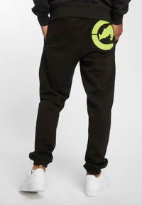 ecko unltd. URBAN CLASSICS 2FACE  - Træningsbukser - black green