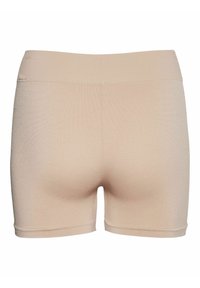 Shorts beige a coste con una ampia vita elasticizzata, caratterizzati da una texture liscia e un design aderente che arriva a metà coscia.