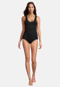 Black tank top with lace trim, fitted design, paired with matching bikini briefs. Fabric appears soft and stretchy.