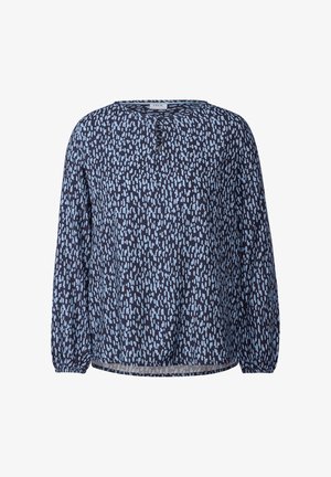 Blouse marine avec un motif abstrait bleu clair, encolure ronde et manches longues froncées. Fabriquée en tissu léger, avec une coupe décontractée.