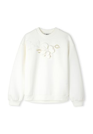 Sweatshirt blanc à manches longues, col rond, avec un détail de broderie florale en blanc et or sur le devant. Texture de tissu lisse.