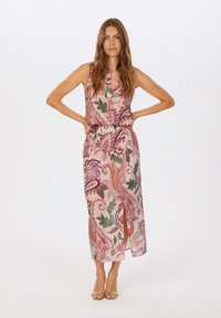 Long pink dress with a floral pattern in red, green, and purple. Sleeveless, buttoned front, fitted waist, and side slit. Lightweight fabric.