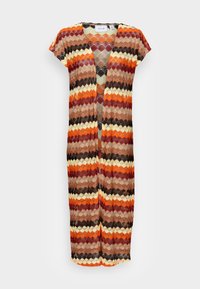 Lång, öppen frontöverdragning i ett virkdesign med sicksackmönster i orange, brunt, kräm och svarta nyanser. Korta ärmar, lätt tyg.