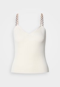 White ribbed tank top with a V-neck, featuring chain link straps in gold and black accents. Smooth texture, form-fitting design.