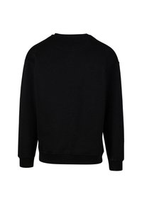 Sudadera negra con cuello redondo, mangas largas y puños y dobladillo acanalados. El material parece suave con una textura lisa.