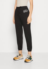 GAP - HERITAGE JOGGER - Tracksuit bottoms - true black Thumbnail Image 1