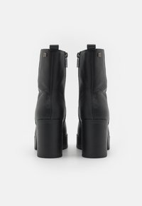 mtng SIXTIES - Botines de tacón - black
