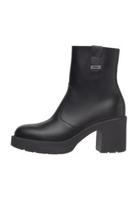 Black leather ankle boot with a chunky heel, smooth texture, side stitching, and a small loop at the back for easy wear.