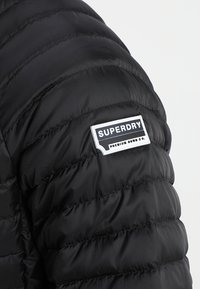 Superdry & Co Dunjacka - black